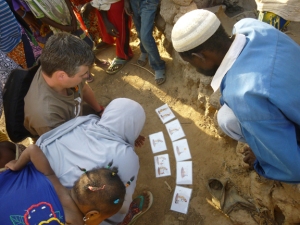 Jonathan Oglesby tests solar disinfection pictograms with the Songhai.