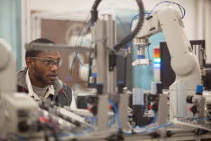 WKU senior Justin Edwards-Page works in the advanced manufacturing lab at the Environmental Sciences and Technology Building. (WKU photo by Clinton Lewis)