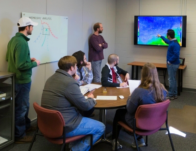     Dr. Josh Durkee and WKU meteorology students at work in the CHAOS (College Heights Atmospheric Observatory for Students) facility.