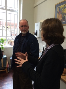 ZSEIFS leader Dr. Mike Stokes pauses to speak with a faculty member at the University of Stellenbosch.